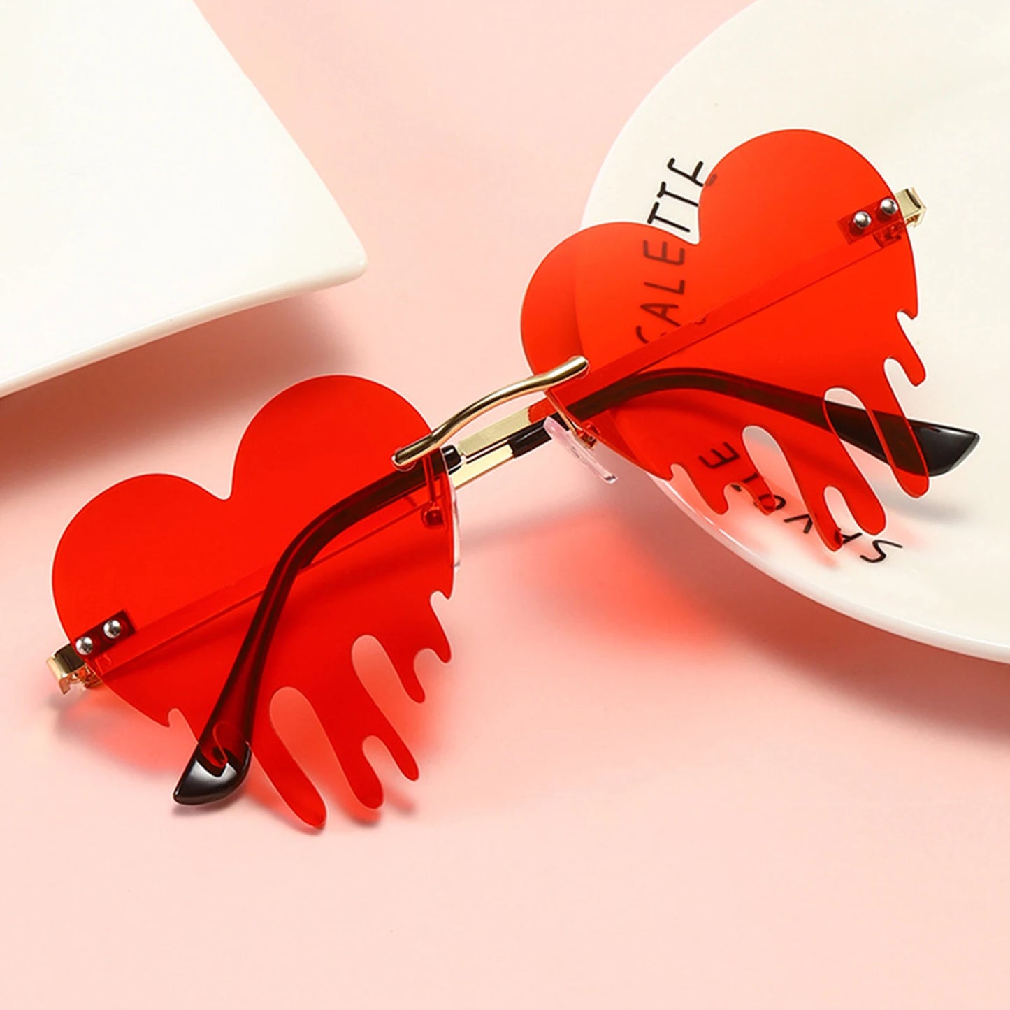Dripping heart sunglasses